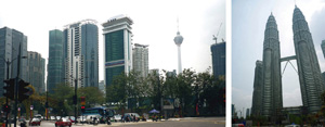 KLのシンボル、ペトロナスツインタワー（右）と建設中の高層ビルも目立つ中心部